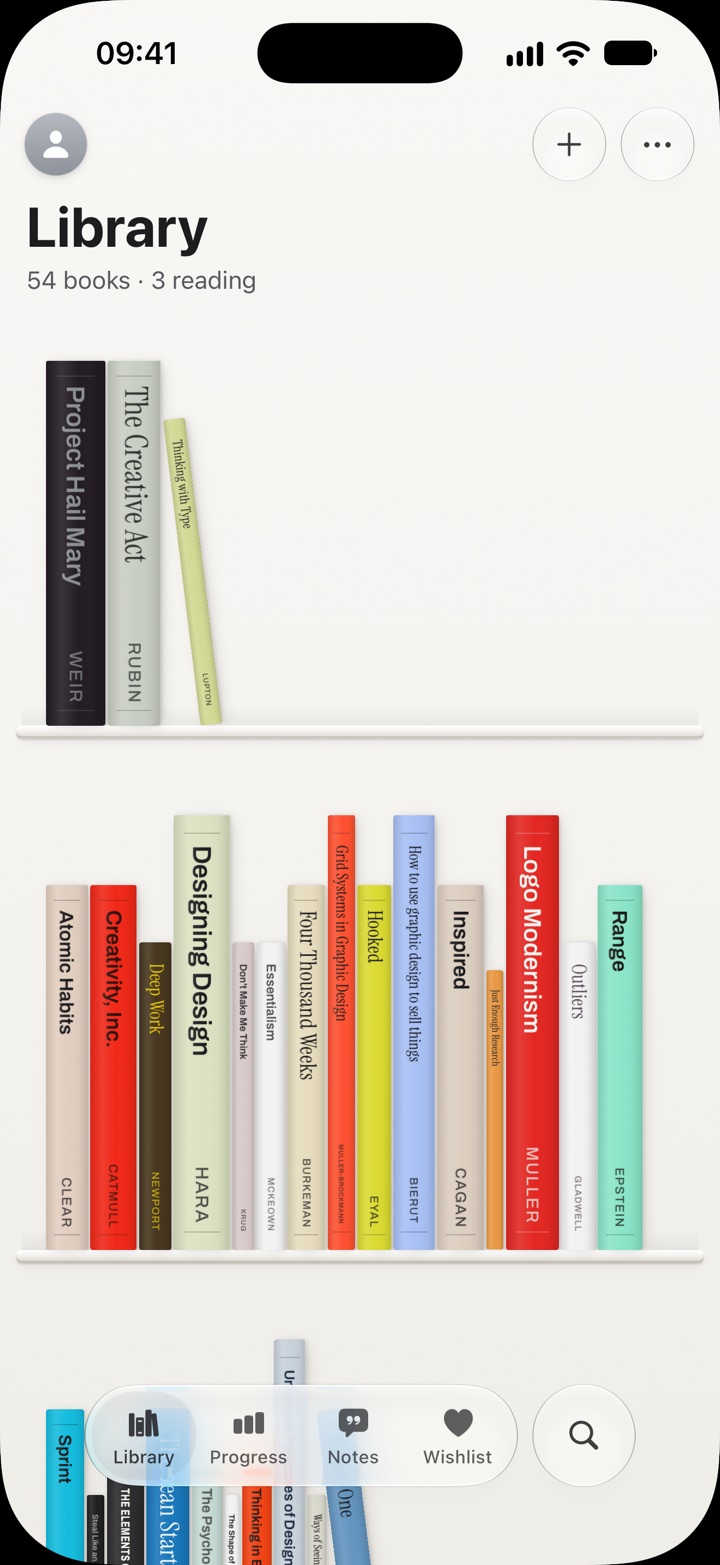 The Library: books standing as spines on white shelves